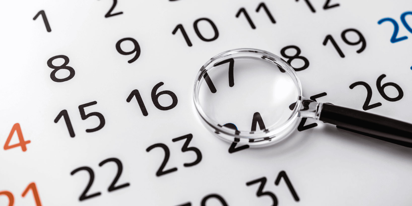 Calendar with magnifying glass highlighting notice period deadline for terminating an apartment lease