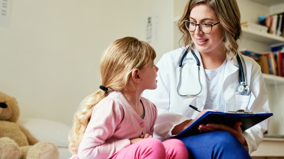 Medical check-up for a child in the UK – accessing primary NHS healthcare for expats and families.