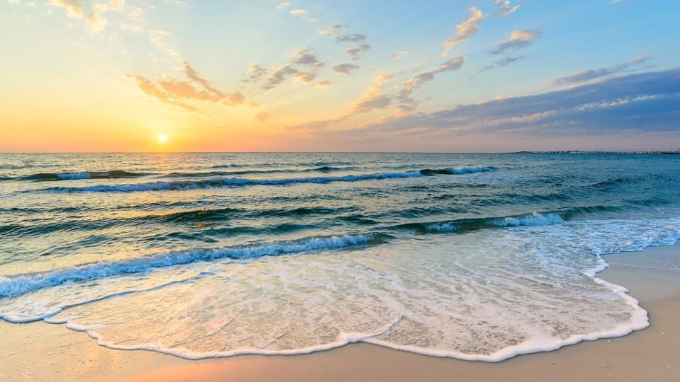 Beach in Tunisia with a view of the sea at sunset