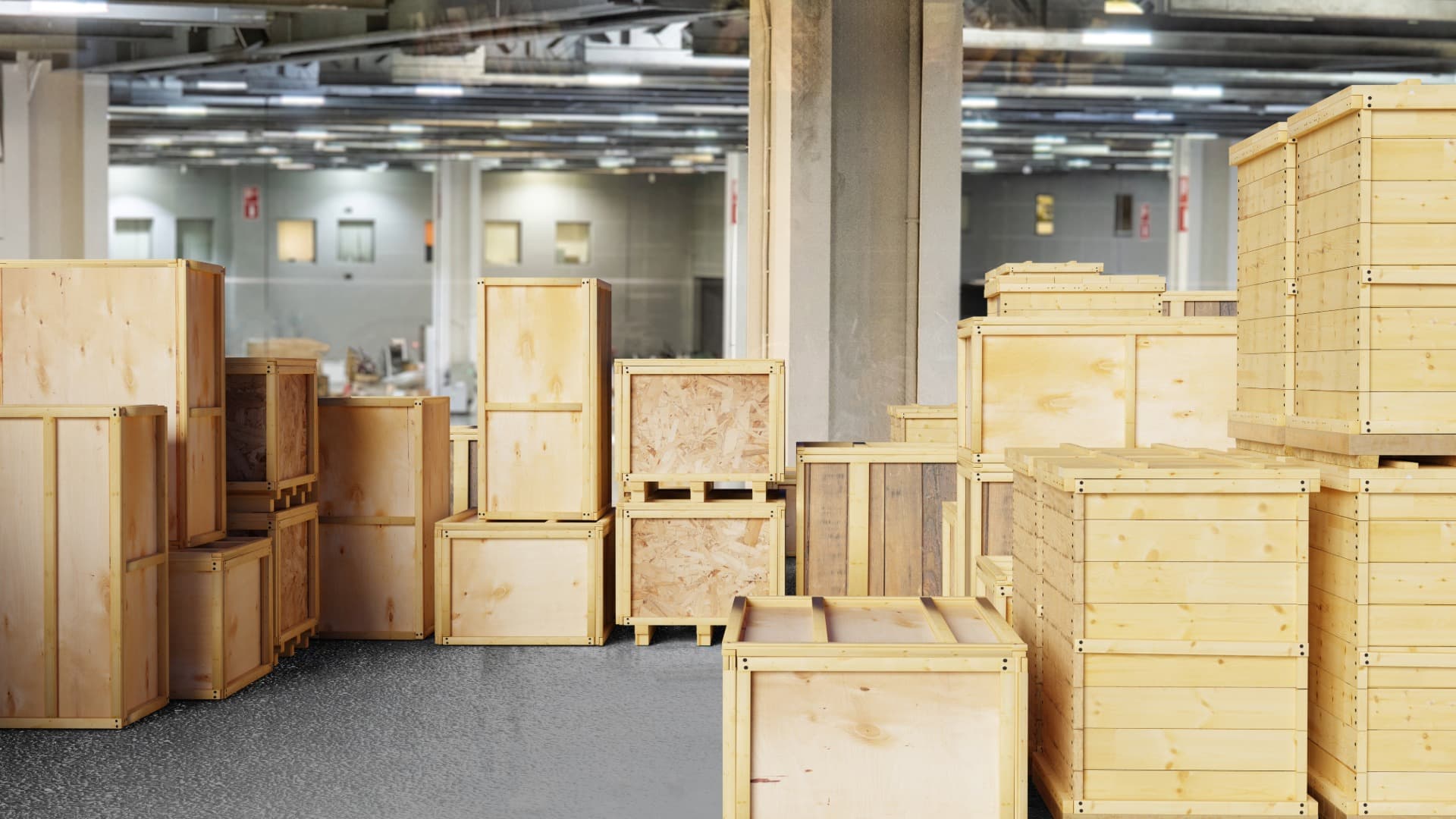 Liftvan wooden crates of various sizes in a warehouse – shipping crates for international moves