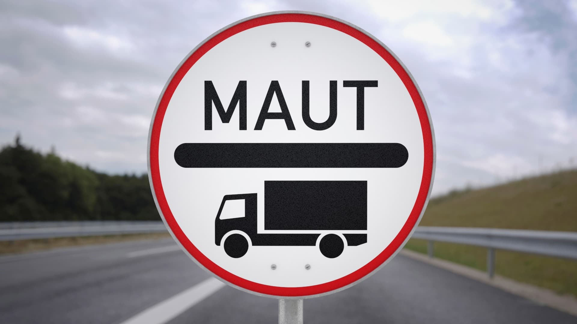MAUT-Schild mit LKW-Symbol an der Straße – Hinweis auf Mautpflicht auf der Autobahn