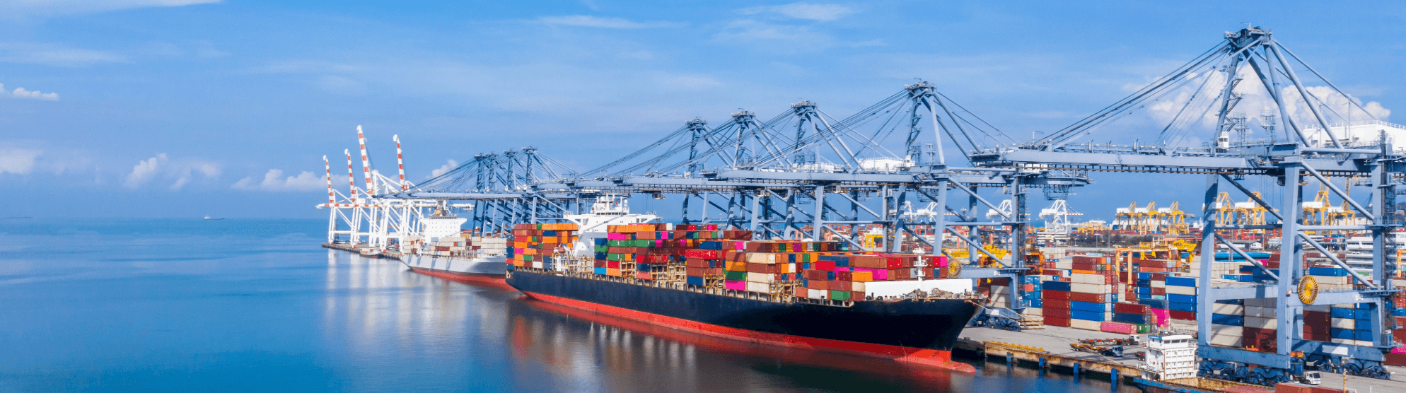 Container ships at the quay, optimal planning for sea freight removals and international transport.