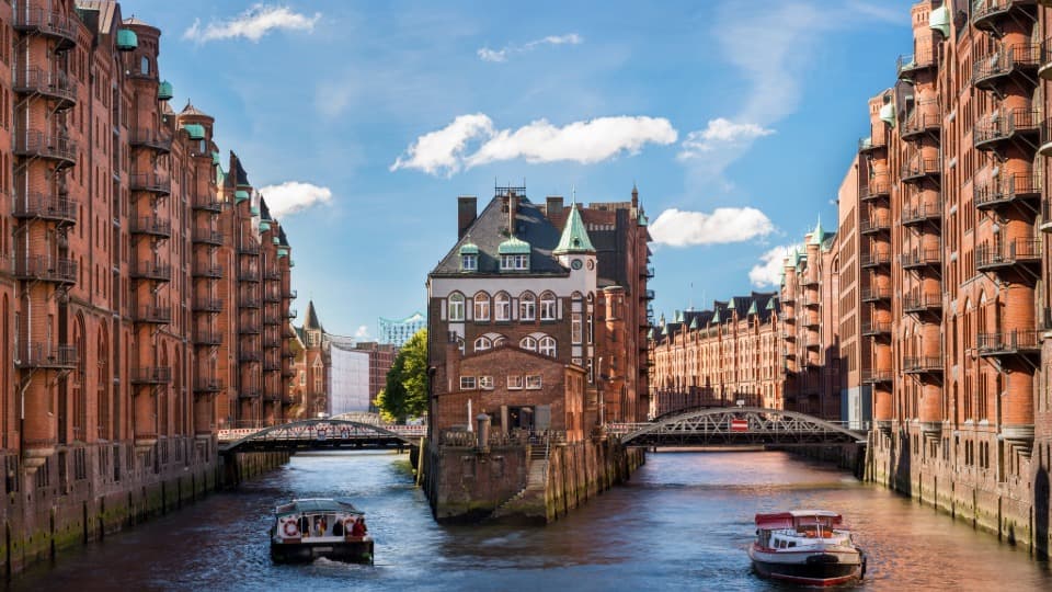 Hamburg's Speicherstadt district featuring the Wasserschloss – a symbol of logistics, trade, and attractive job markets in Germany.