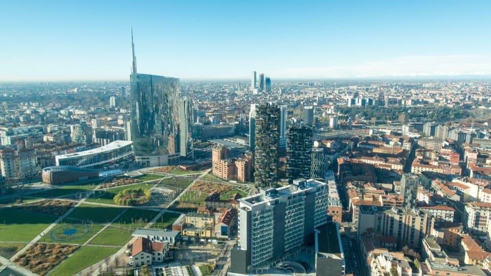 Modern Milan skyline featuring the Unicredit Tower – Italy's economic hub and prime location for international professionals.