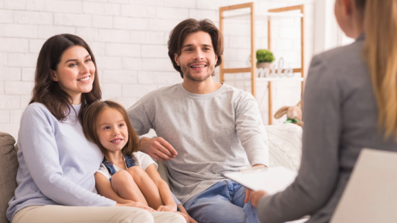 Family in a consultation meeting during relocation service for an international assignment.