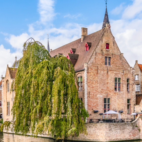 Historic old town of Bruges with canal and belfry in Belgium